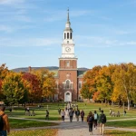 Dartmouth Essay Questions Guide: Prompts & Strategies 3 Historic Baker-Berry Library tower overlooking Dartmouth College green in autumn (AI Generated Image)